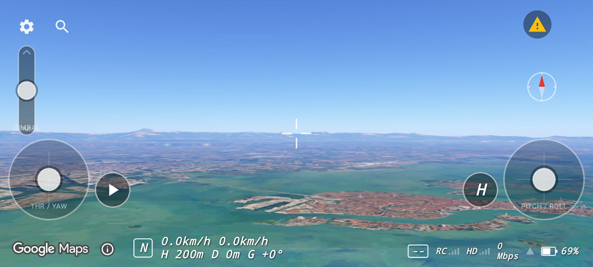 High over an island city on Google Maps 3D
